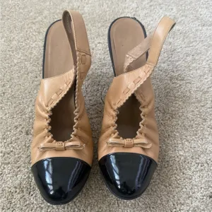 CHANEL slingback CC bow accent high heel