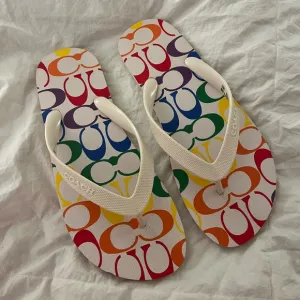Coach women’s Multicolor Flip Flops - NWOT - size 8