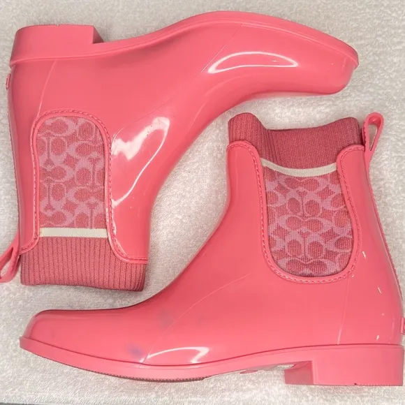 Coach Womens rain boots size 8, pink, with signature coach logo sock upper