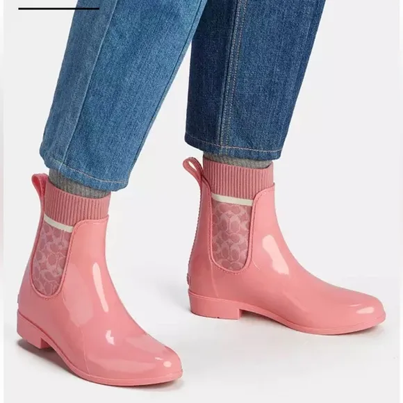 Coach Womens rain boots size 8, pink, with signature coach logo sock upper