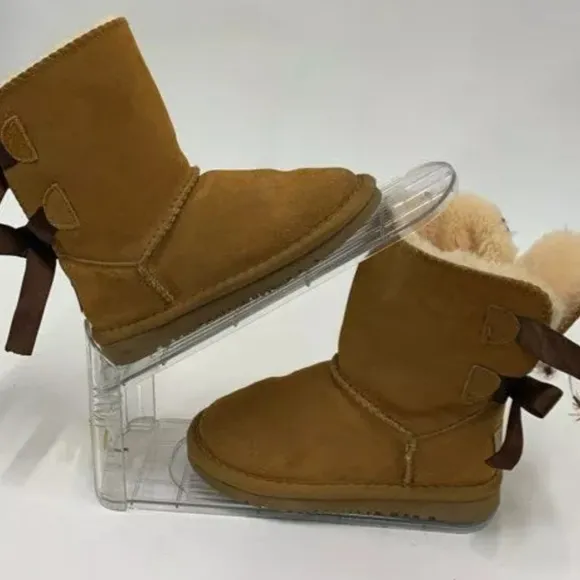 Girl's UGG Boots       bow defect READ DESCRIPTION