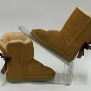 Girl's UGG Boots       bow defect READ DESCRIPTION