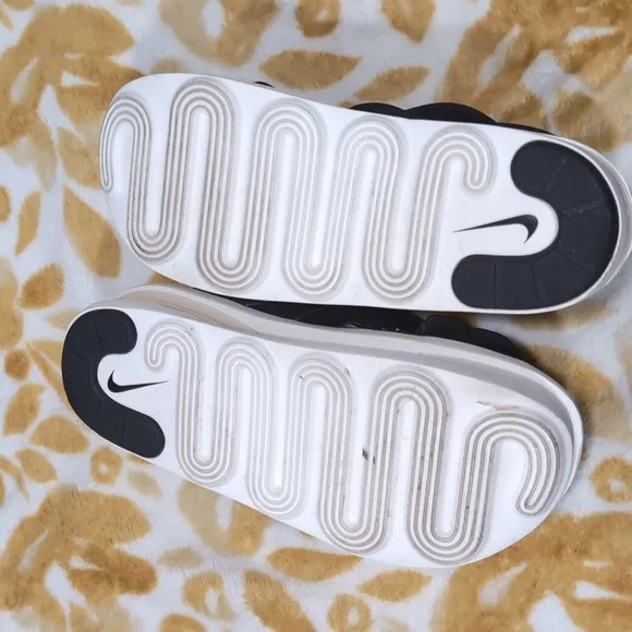 Nike Black and White Sandals with Crisscross Straps and Thick Sole