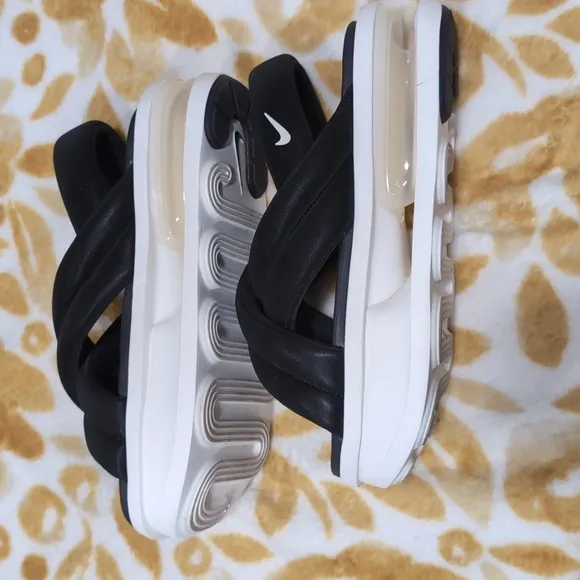 Nike Black and White Sandals with Crisscross Straps and Thick Sole