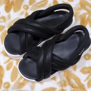 Nike Black and White Sandals with Crisscross Straps and Thick Sole