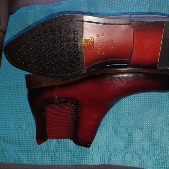 Red and Black Leather Boots with Sleek Design