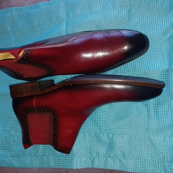 Red and Black Leather Boots with Sleek Design