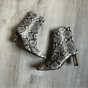 Staud snakeskin ankle boots