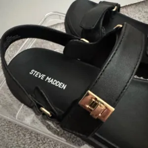 Steve Madden Black Sandals with Gold Buckle