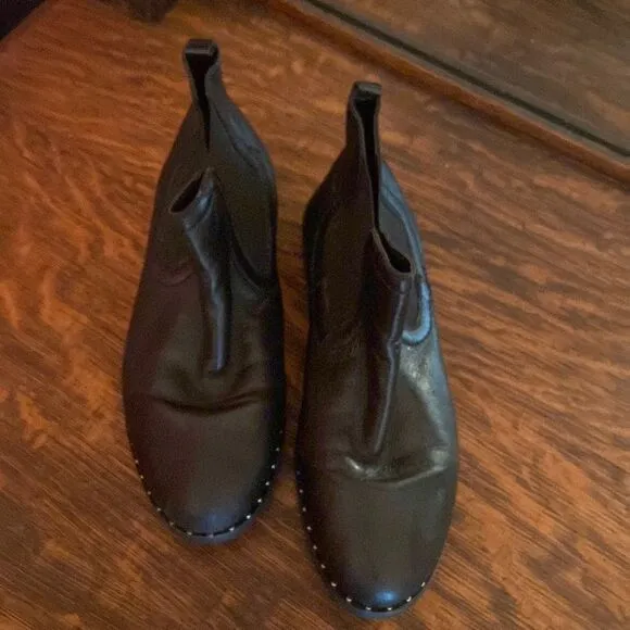 Steve Madden size 7, black leather ankle boots, with silver studs around bottom
