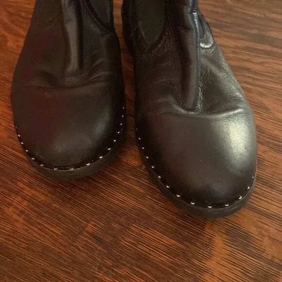 Steve Madden size 7, black leather ankle boots, with silver studs around bottom