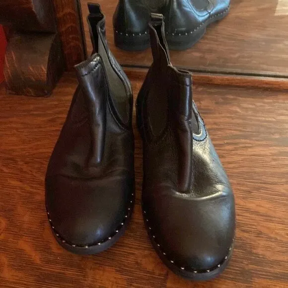 Steve Madden size 7, black leather ankle boots, with silver studs around bottom