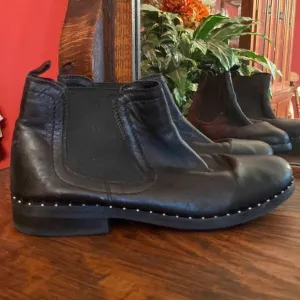 Steve Madden size 7, black leather ankle boots, with silver studs around bottom