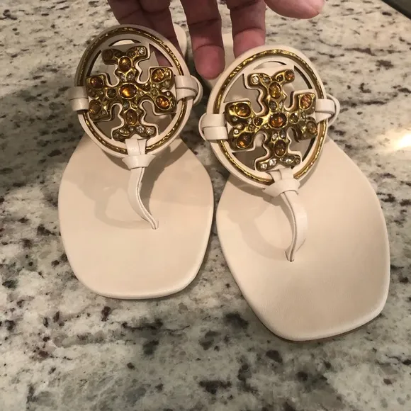 Tory Burch Cream Gold Sandals with Ornate Medallions