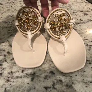 Tory Burch Cream Gold Sandals with Ornate Medallions