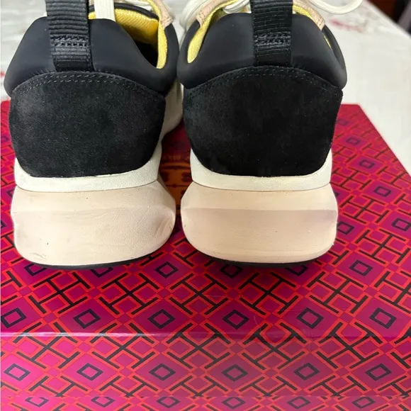Tory Burch. Good luck trainers.Stylish Black and Tan Women's Sneakers.