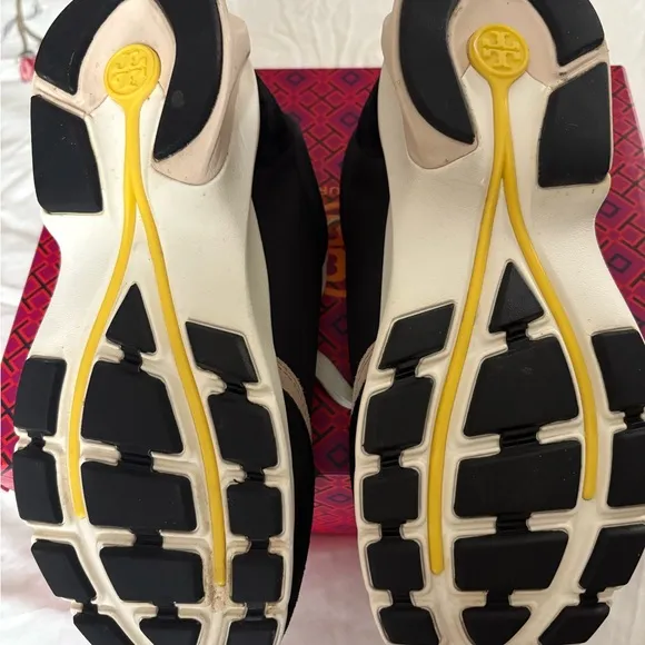 Tory Burch. Good luck trainers.Stylish Black and Tan Women's Sneakers.