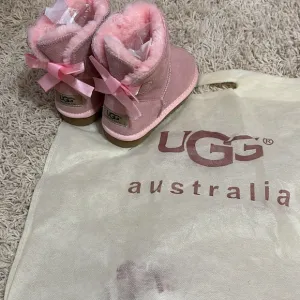 UGG Pink Boots with Sheepskin and Bows