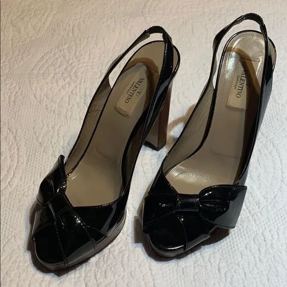 Valentino Garavani Patent sling back bow heels. 38